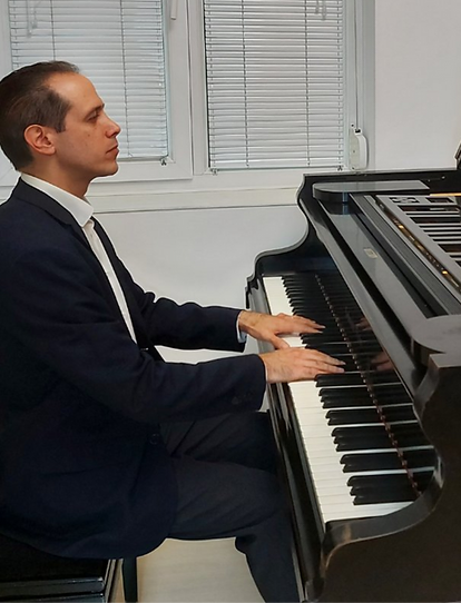 Chris, Piano and Theory teacher at First Musical Academy
