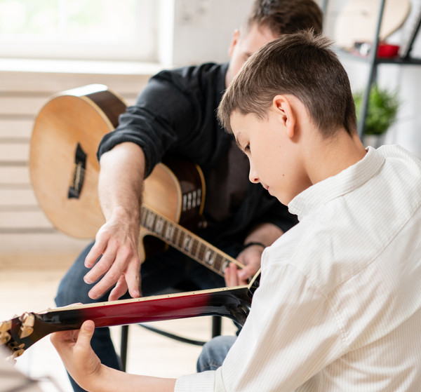 Ferenc, guitar and piano teacher at First Musical Academy